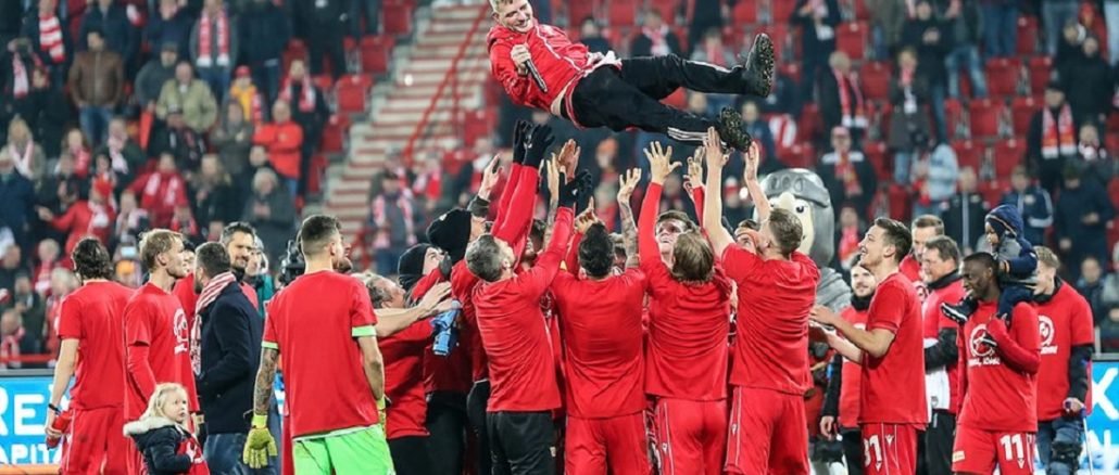 Union Berlin players celebrate after their win over leaders Monchengladbach